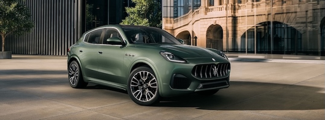 A green 2025 Maserati Grecale parks on the street.