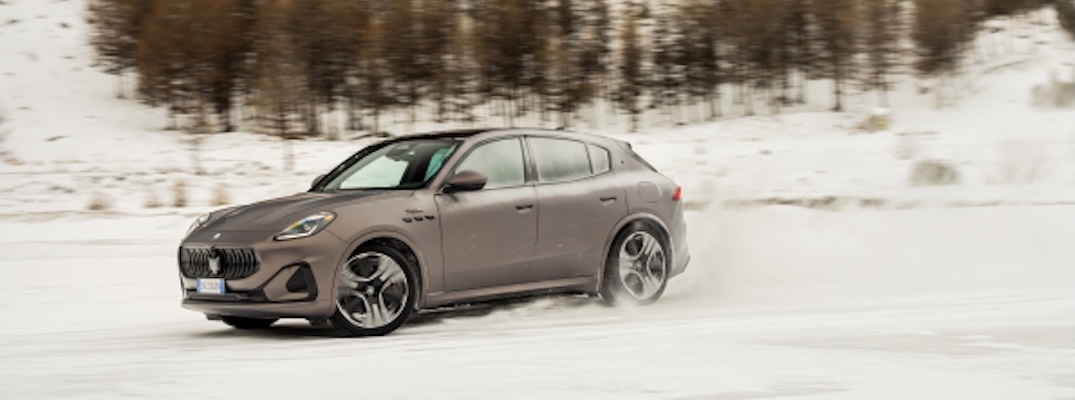 A 2025 Maserati Grecale Folgore drives in the mountains.