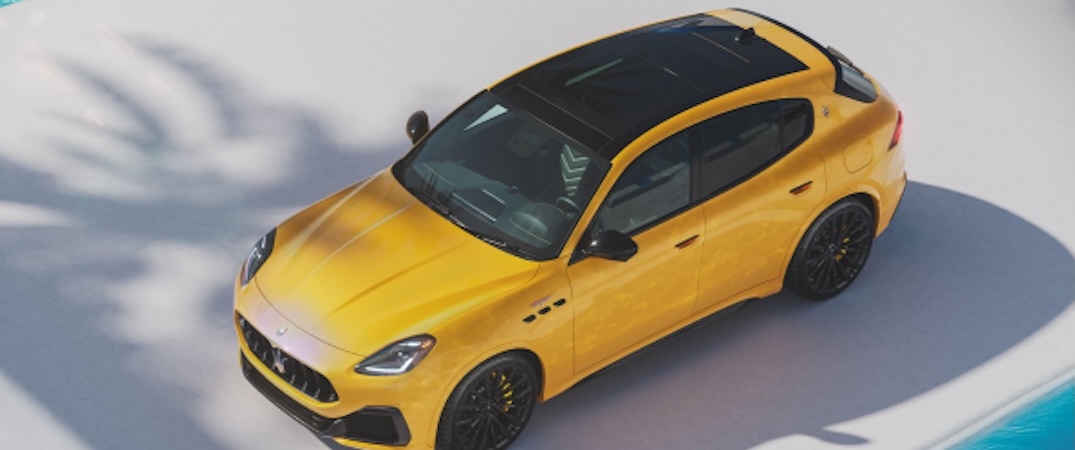 A yellow 2025 Maserati Grecale from an overhead angle showcasing the front.