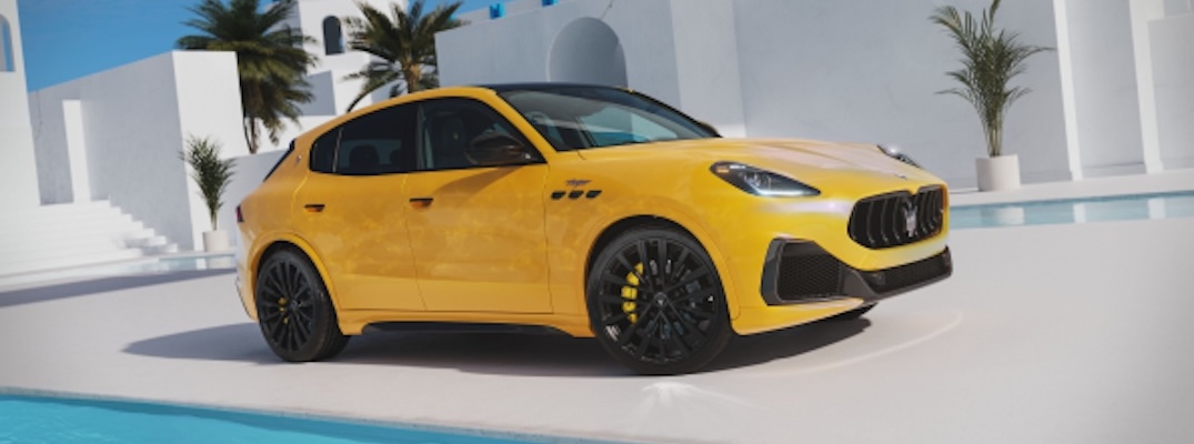A yellow 2025 Maserati Grecale from an overhead angle showcasing the side.