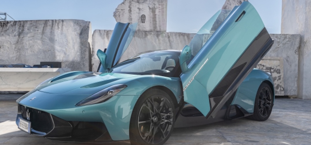 A 2026 Maserati MCPura with its doors open in a V.