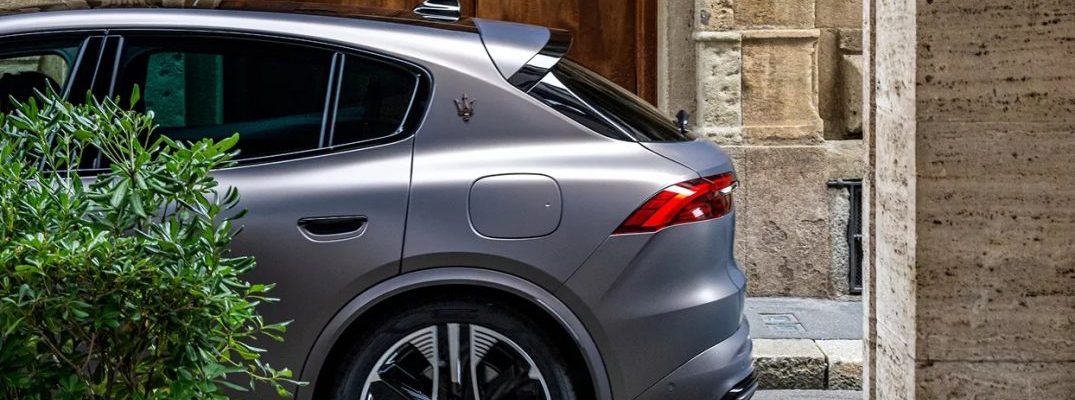 The rear end of a silver 2025 Maserati Grecale Folgore.